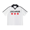 White shirt with black collar and trim, featuring 'JOCARDE' and three red stars on a white background.