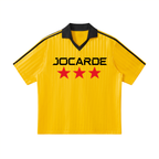 Yellow sports jersey with black collar and red stars on a white background