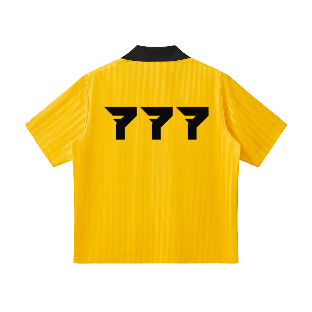 Yellow shirt with black logo on the back against a white background