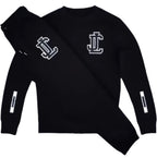 Black long-sleeve shirt with white logo on a white background